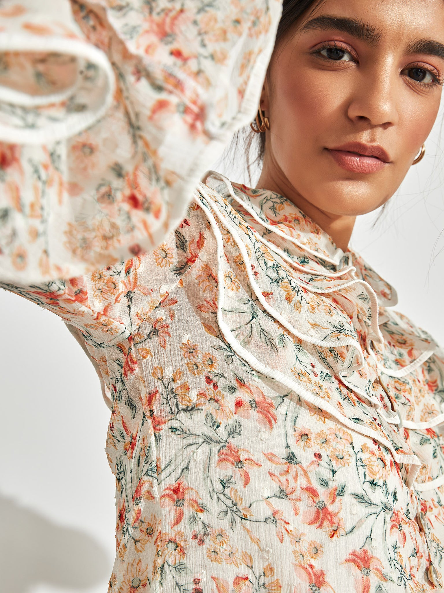

Floral Ruffle Neck Top