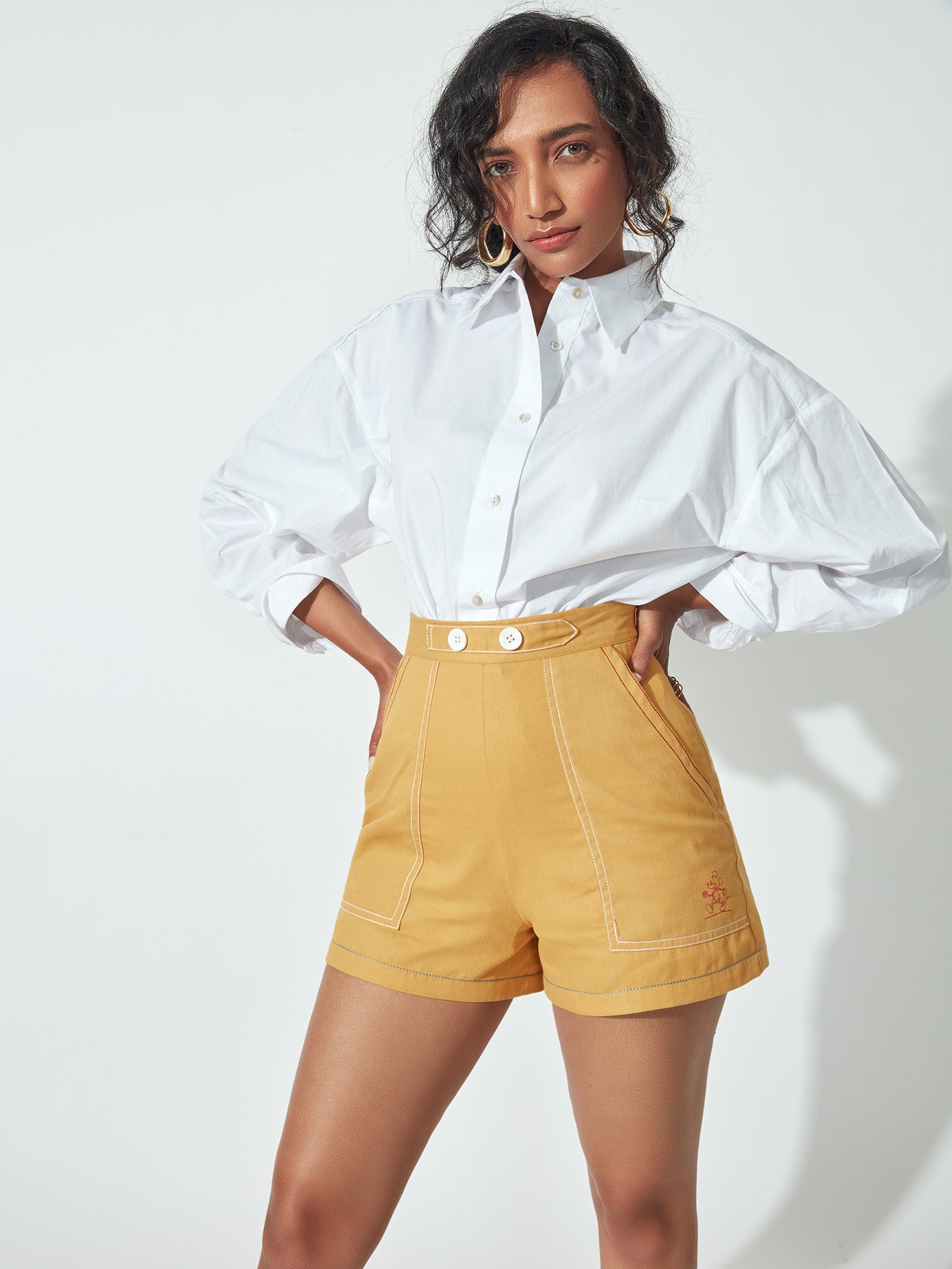 Mustard Topstitch Buttoned Flap Shorts by Disney