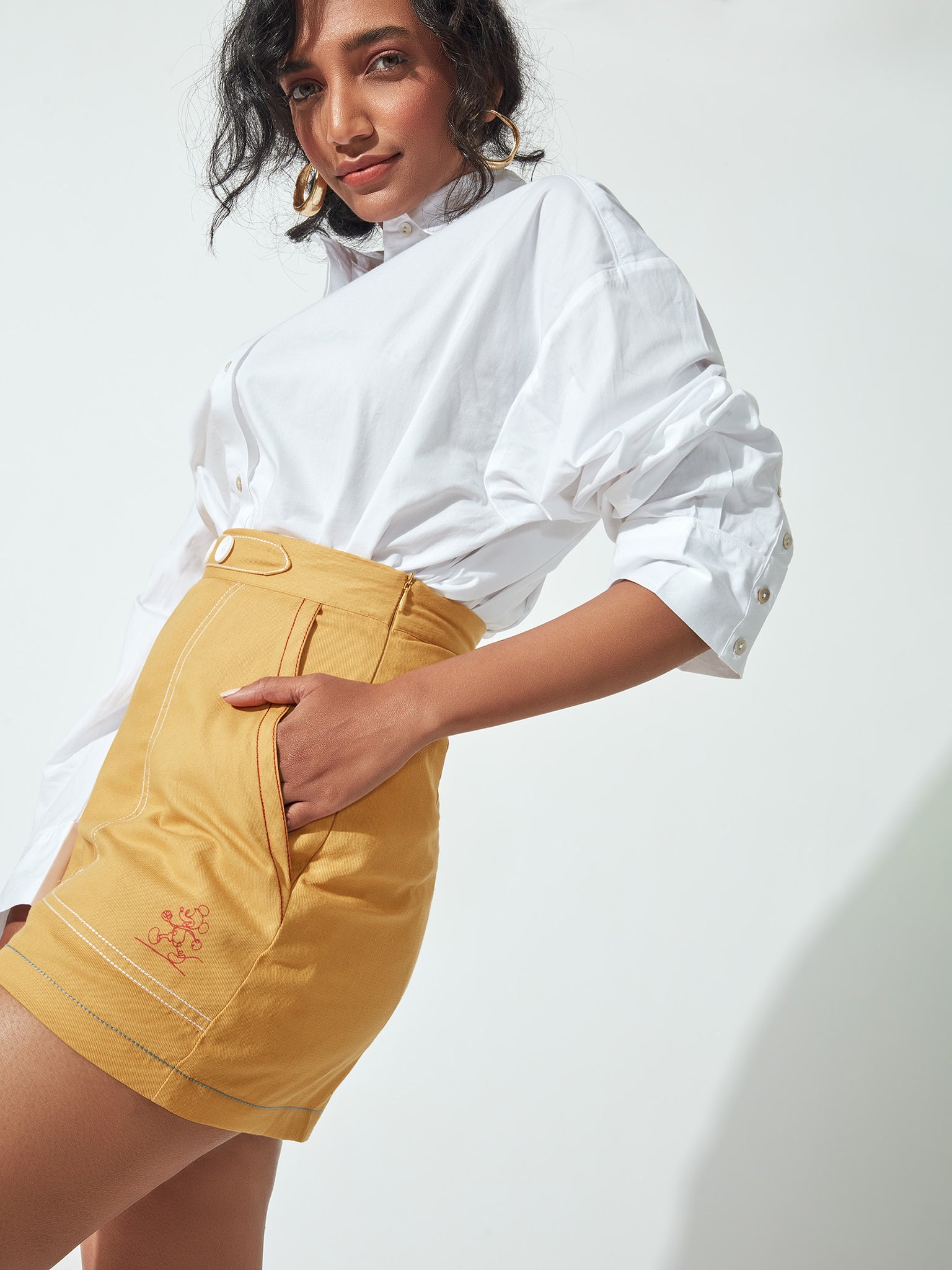 

Mustard Topstitch Buttoned Flap Shorts by Disney